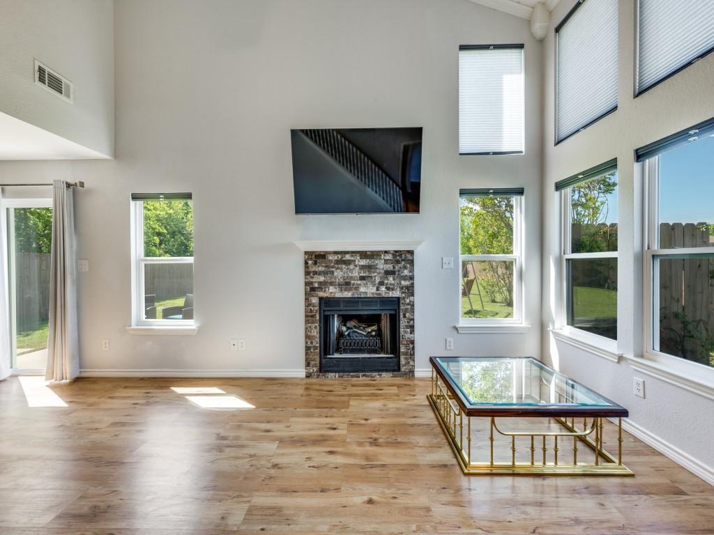 401 North Sierra Trail Pilot Point, TX 76258 - Photo 15 of 30 a living room with furniture fireplace and window