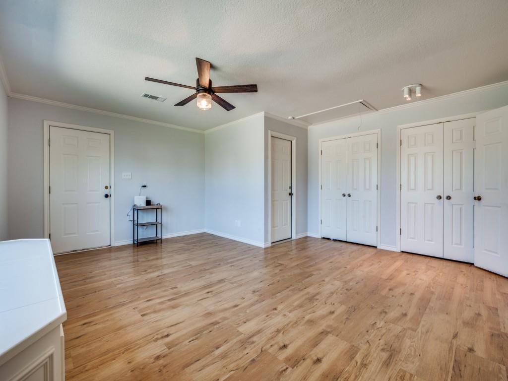 401 North Sierra Trail Pilot Point, TX 76258 - Photo 19 of 30 a view of empty room with wooden floor