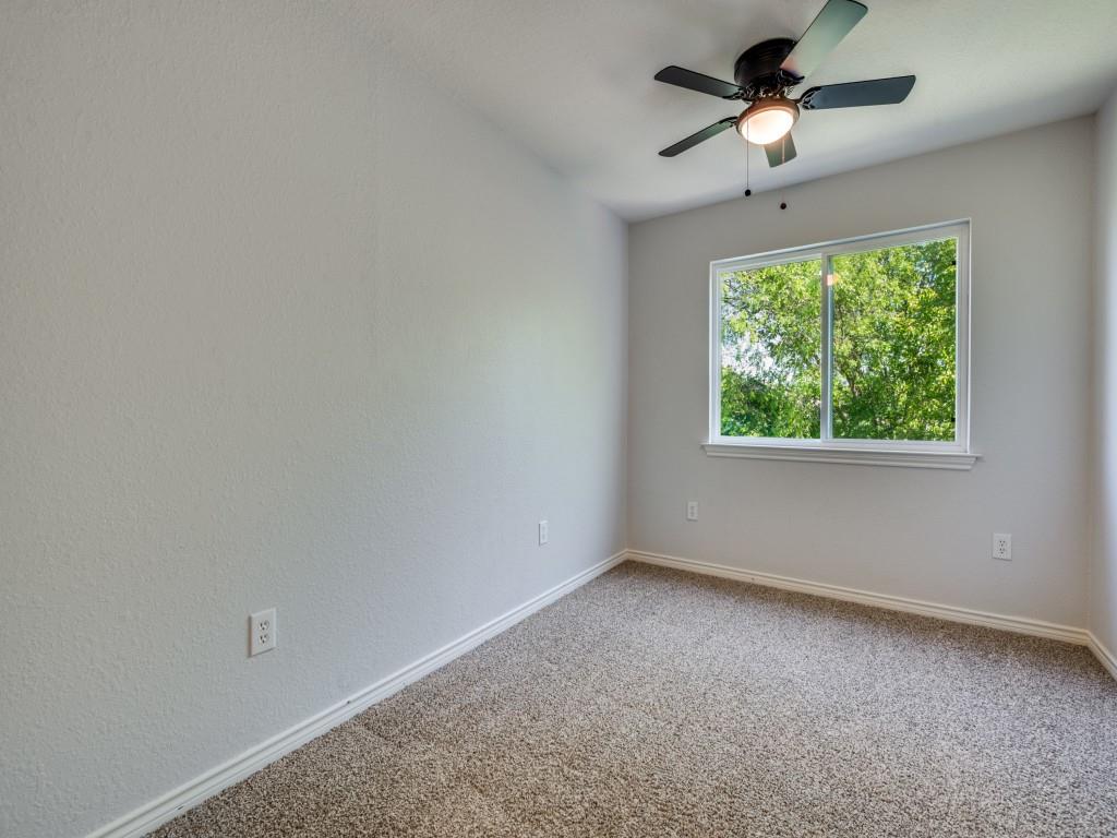 401 North Sierra Trail Pilot Point, TX 76258 - Photo 24 of 30 an empty room with a window and a fan