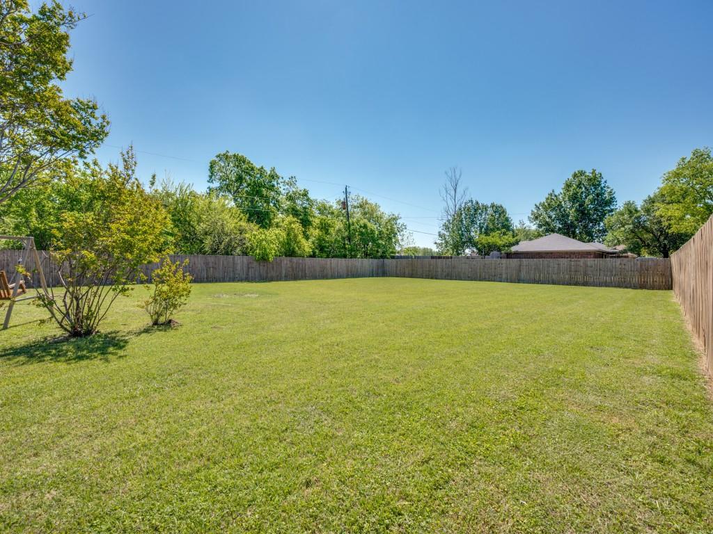 401 North Sierra Trail Pilot Point, TX 76258 - Photo 29 of 30 a view of yard with swimming pool and green space