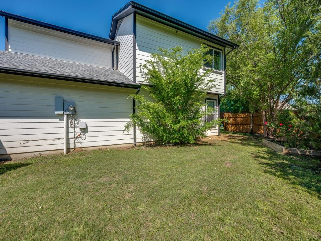 401 North Sierra Trail Pilot Point, TX 76258 - Photo 30 of 30 a front view of a house with garden