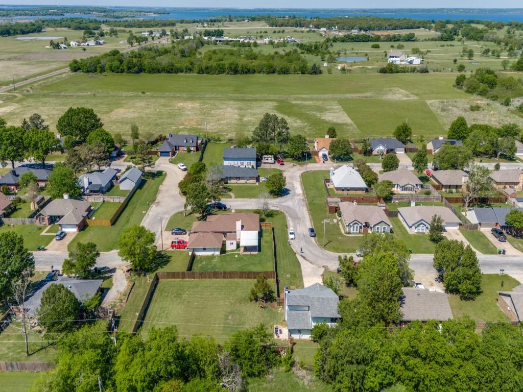 401 North Sierra Trail Pilot Point, TX 76258 - Photo 6 of 30 an aerial view of ocean and residential houses with outdoor space