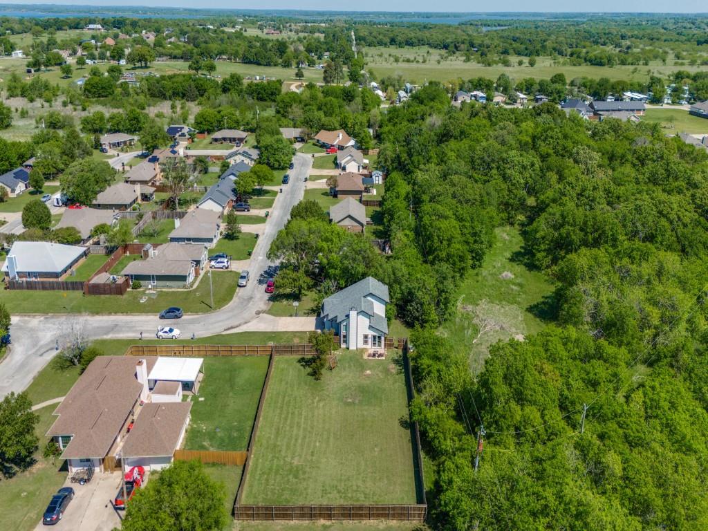 401 North Sierra Trail Pilot Point, TX 76258 - Photo 7 of 30 an aerial view of a house with a yard