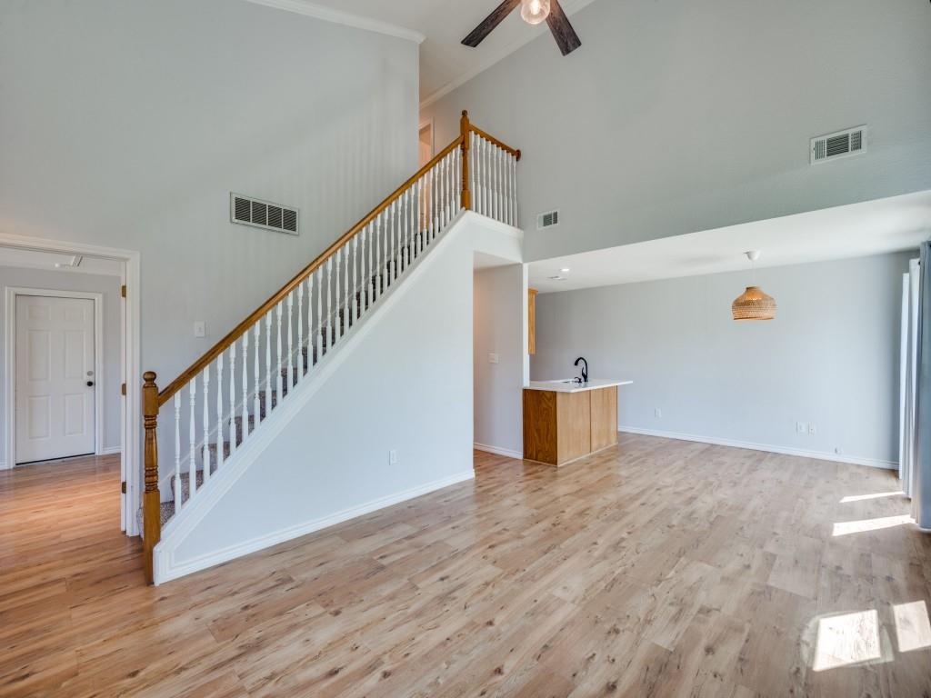 401 North Sierra Trail Pilot Point, TX 76258 - Photo 8 of 30 a view of a hallway with wooden floor and entryway