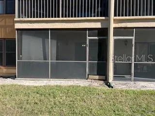a backyard of a house with swimming pool