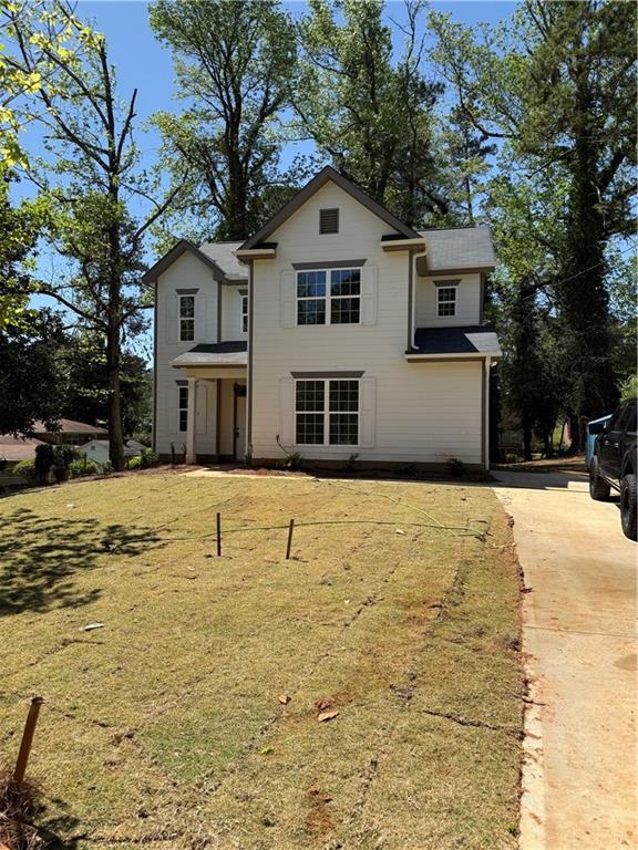 3089 Corbin Avenue Decatur, GA 30034 - Photo 1 of 1 a front view of a house with a yard