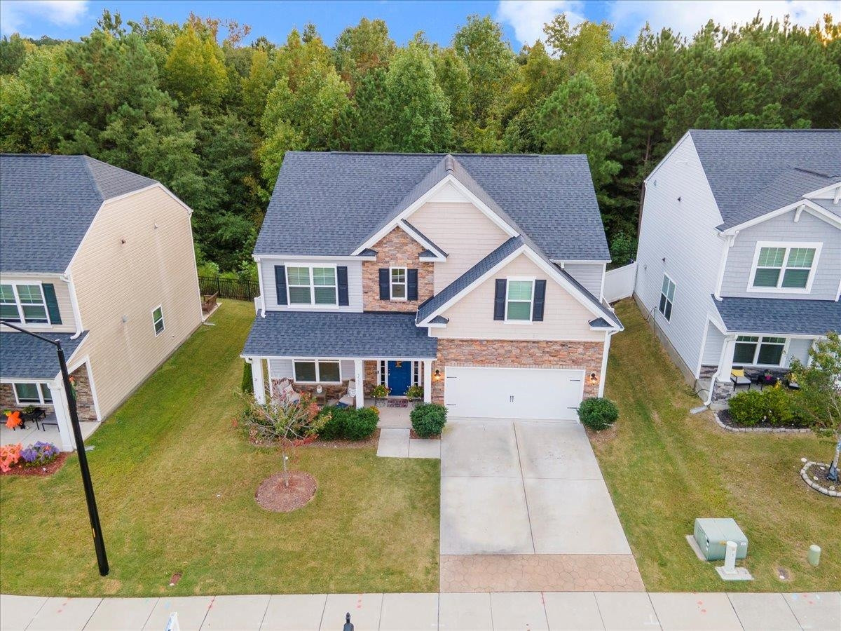3537 Massey Ridge Court Raleigh, NC 27616 - Photo 3 of 41 a aerial view of a house with swimming pool