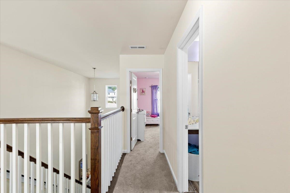 3537 Massey Ridge Court Raleigh, NC 27616 - Photo 32 of 41 a view of a hallway with a livingroom and entryway