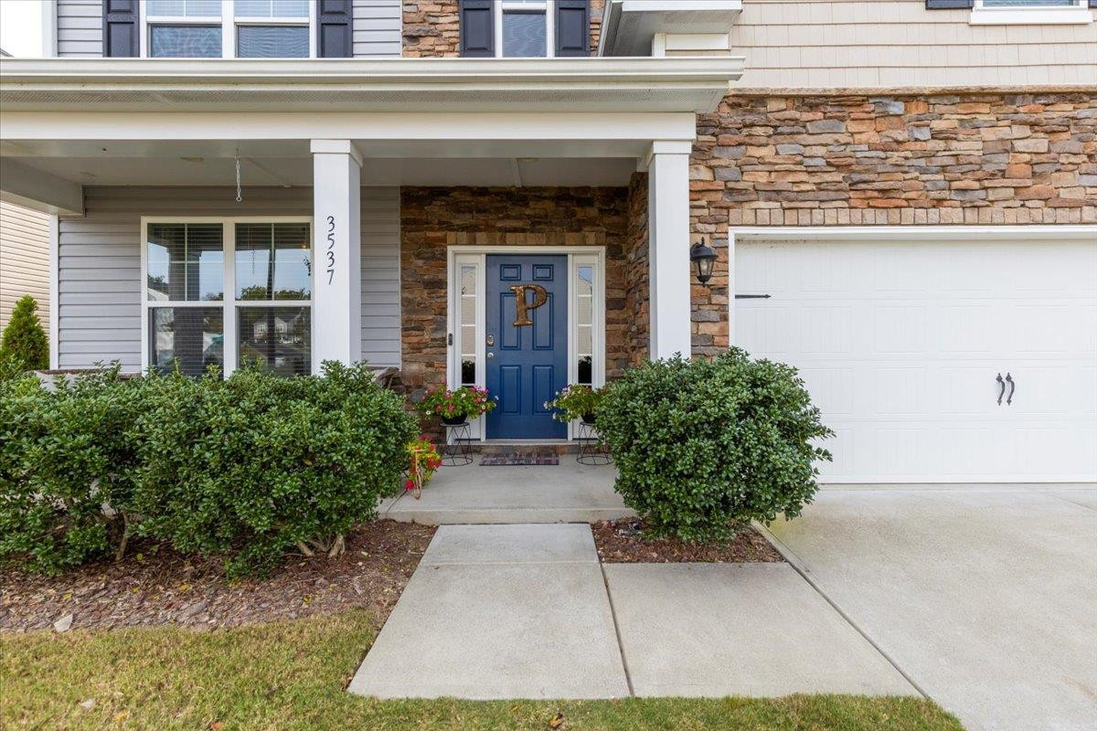 3537 Massey Ridge Court Raleigh, NC 27616 - Photo 5 of 41 a view of a building with potted plants