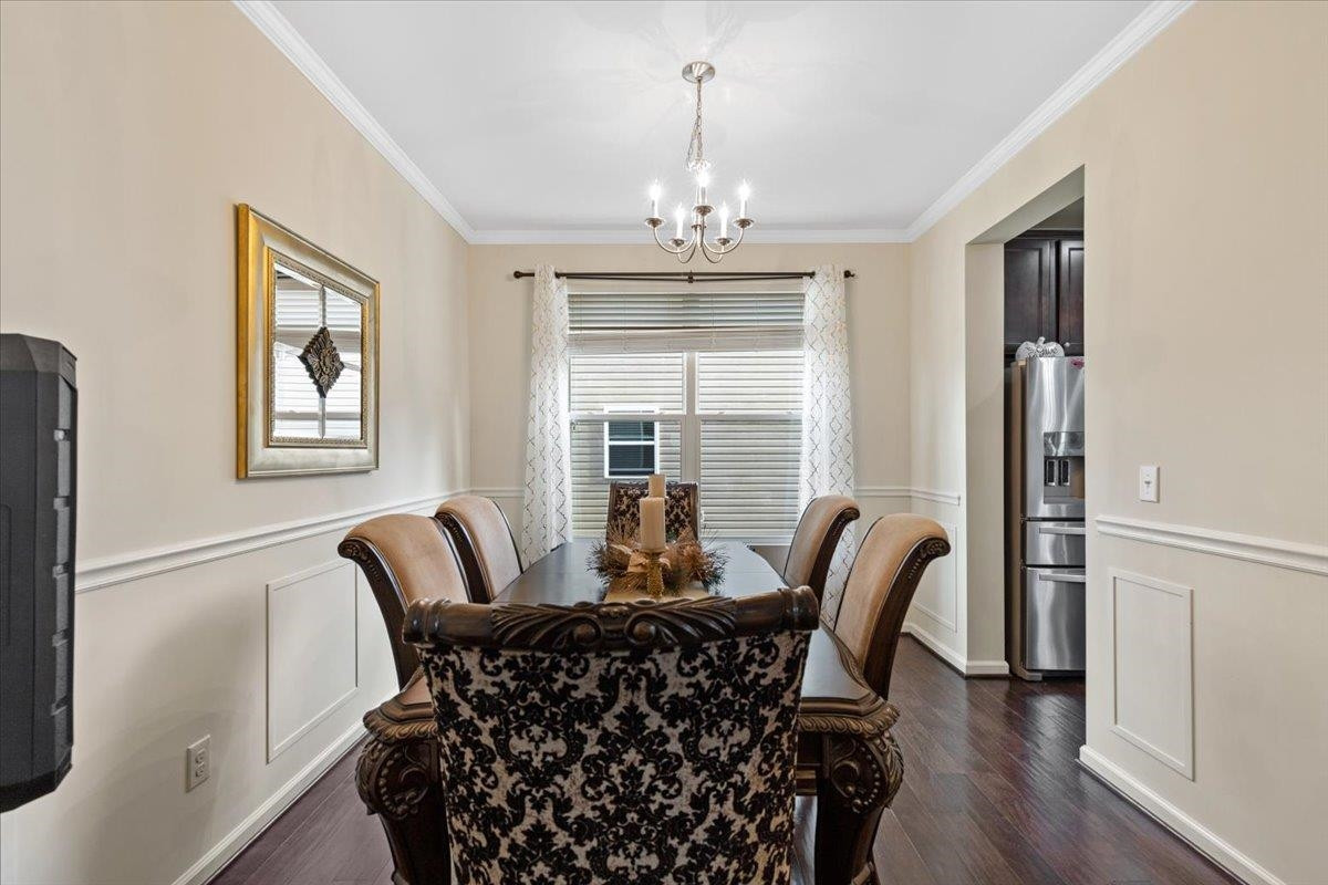 3537 Massey Ridge Court Raleigh, NC 27616 - Photo 8 of 41 a view of a dining room with furniture window and wooden floor
