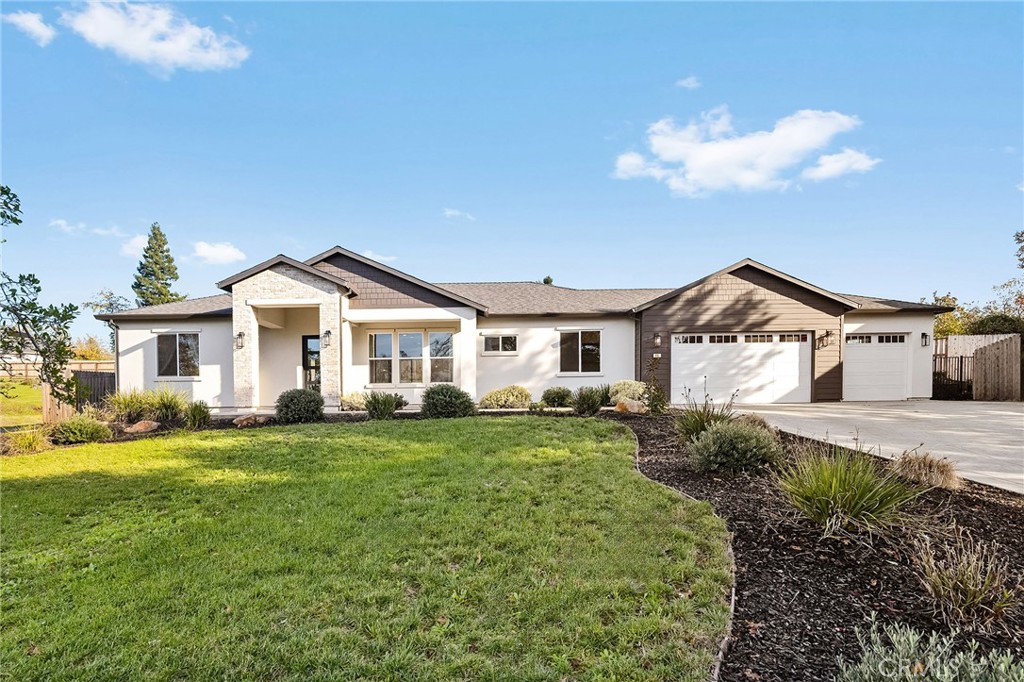 96 Valley View Drive Paradise, CA 95969 - Photo 2 of 47 a front view of a house with a garden