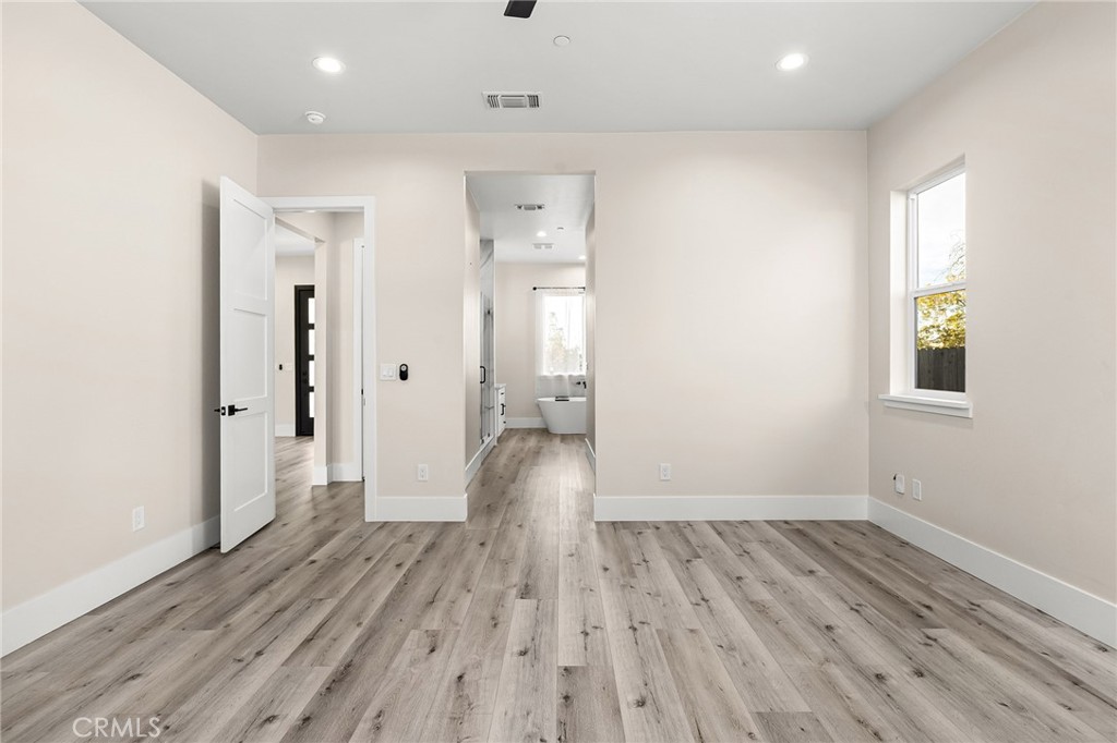 96 Valley View Drive Paradise, CA 95969 - Photo 25 of 47 wooden floor in an empty room with a window
