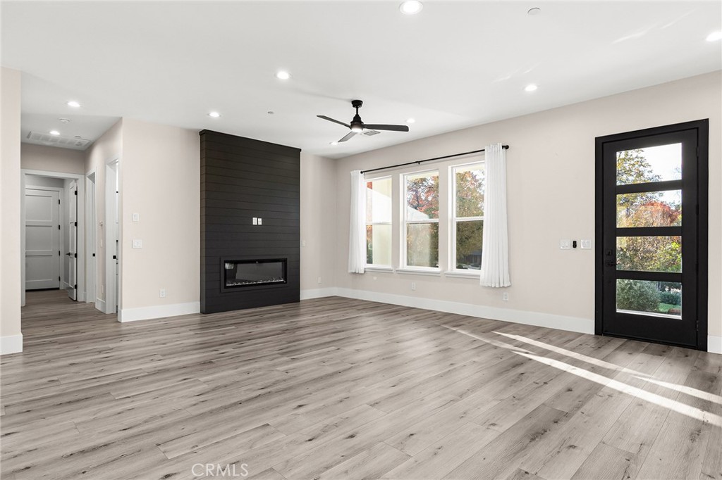 96 Valley View Drive Paradise, CA 95969 - Photo 3 of 47 a view of an empty room with a window and wooden floor