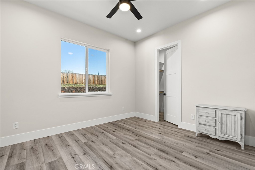 96 Valley View Drive Paradise, CA 95969 - Photo 35 of 47 wooden floor in an empty room with a window