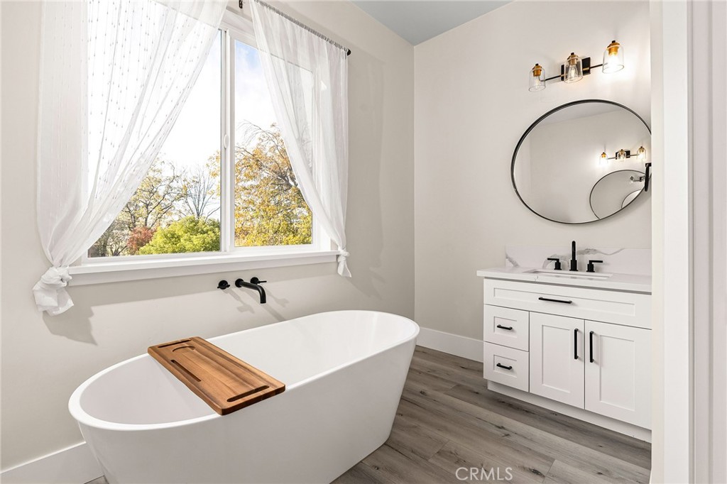 96 Valley View Drive Paradise, CA 95969 - Photo 5 of 47 a bathroom with a tub sink and mirror