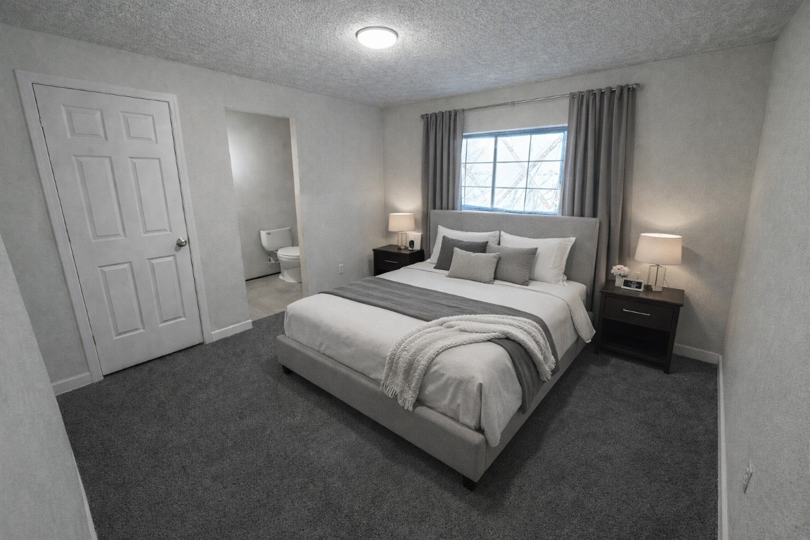 5423 Grace Point Lane Houston, TX 77048 - Photo 3 of 6 a bedroom with a bed and a window