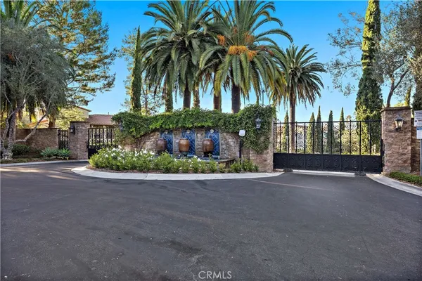 front view of house with palm trees
