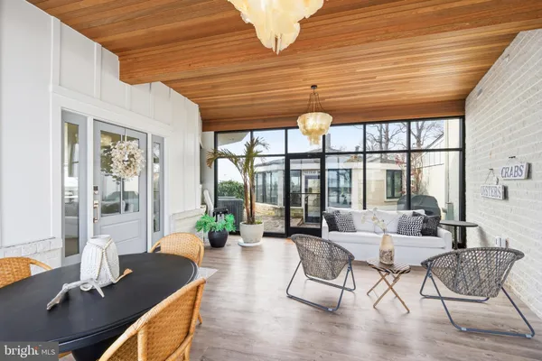 a bedroom with a bed and a television