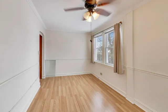 a view of a balcony with wooden floor and staircase