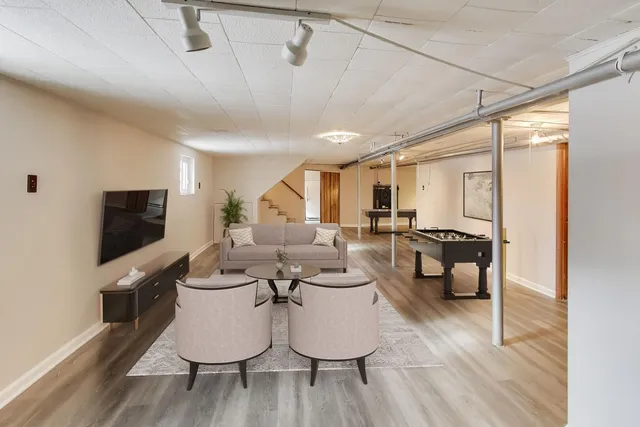 a view of a house with a snow in the yard