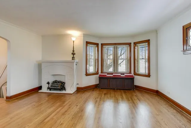 a spacious bathroom with a double vanity sink a mirror and a shower
