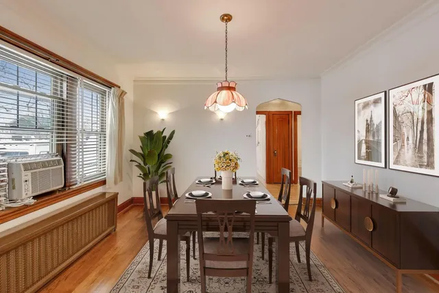 a view of a kitchen with a refrigerator and a sink