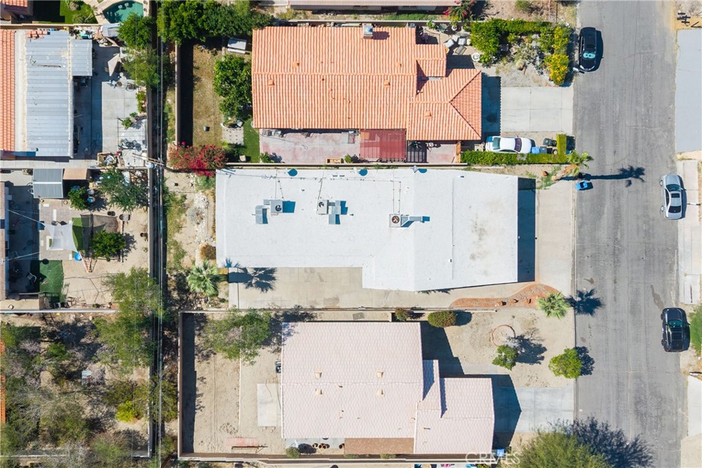 12700 Parma Drive Desert Hot Springs, CA 92240 - Photo 11 of 20 an aerial view of residential houses with outdoor space