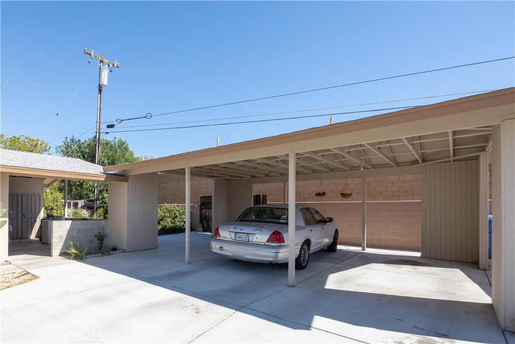12700 Parma Drive Desert Hot Springs, CA 92240 - Photo 5 of 20 a car parked in front of house