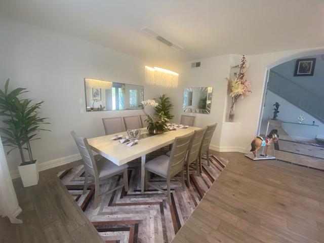 3497 Foxmore Lane Rescue, CA 95672 - Photo 14 of 83 a view of a dining room with furniture and wooden floor