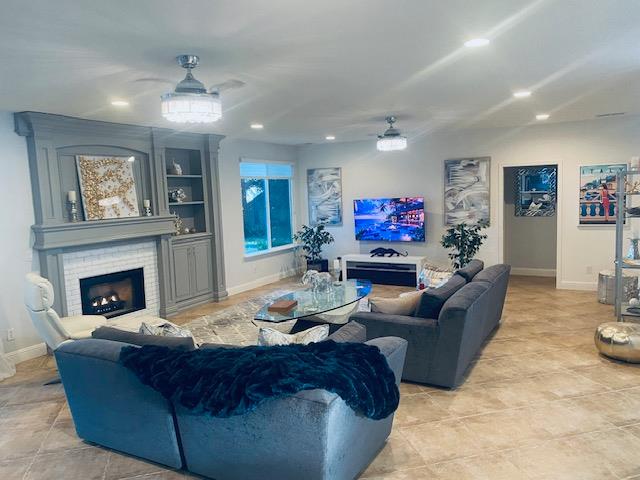 3497 Foxmore Lane Rescue, CA 95672 - Photo 25 of 83 Familyroom gas fireplace and custom lighting