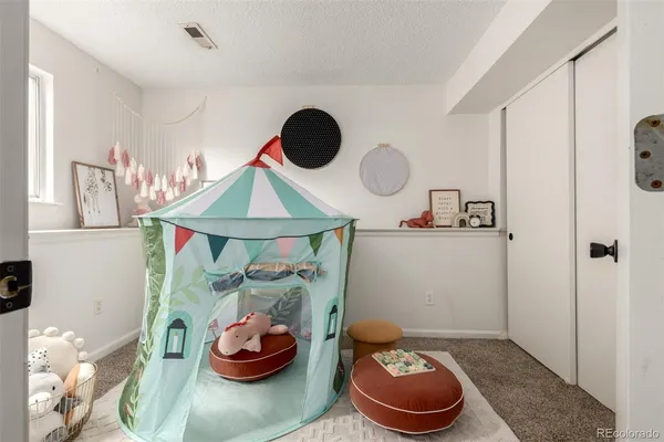 a bathroom with a toilet and a sink