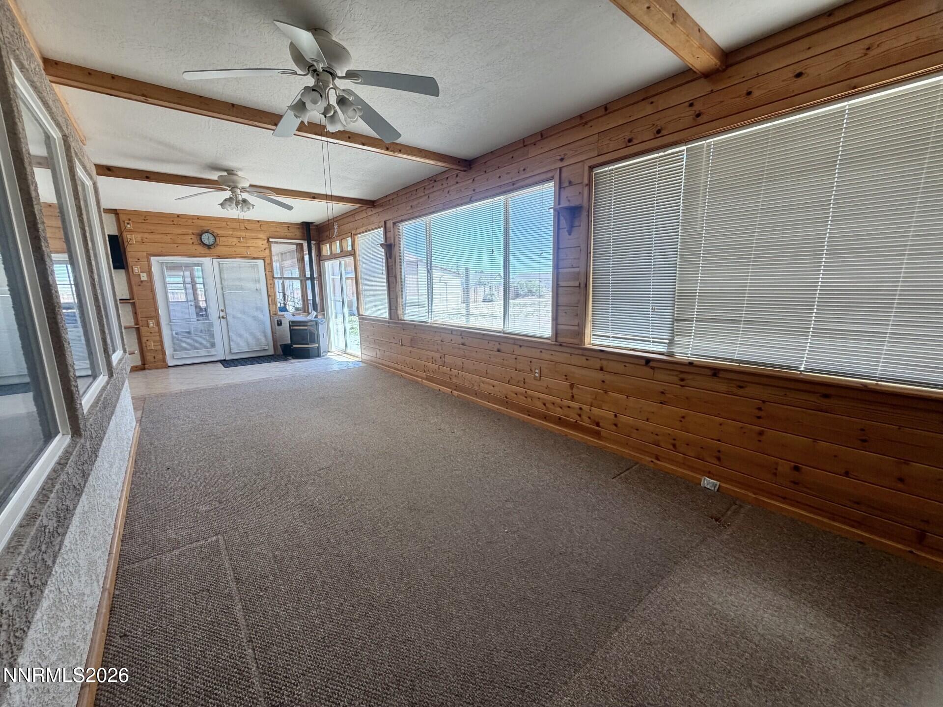 765 Hunter Park Way Fallon, NV 89406 - Photo 12 of 30 a view of a livingroom with wooden floor and a window
