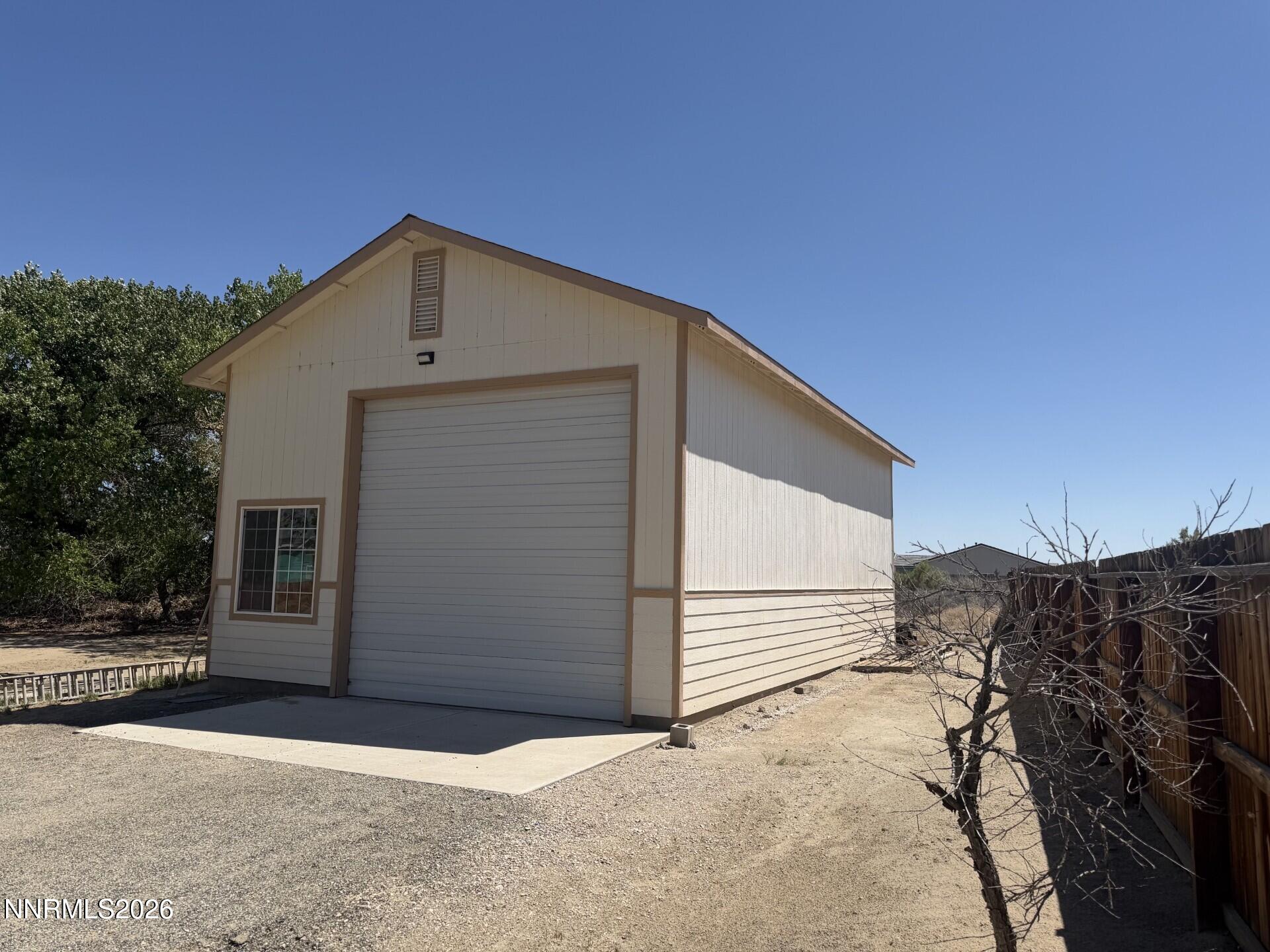 765 Hunter Park Way Fallon, NV 89406 - Photo 26 of 30 a view of a house with a yard