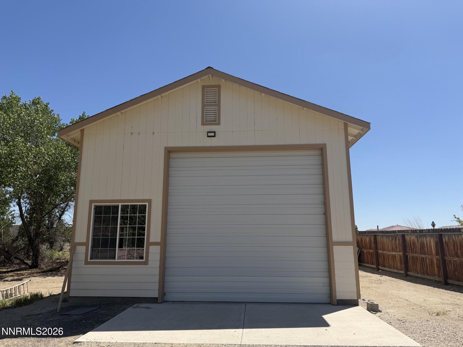 765 Hunter Park Way Fallon, NV 89406 - Photo 27 of 30 a front view of a house with a yard