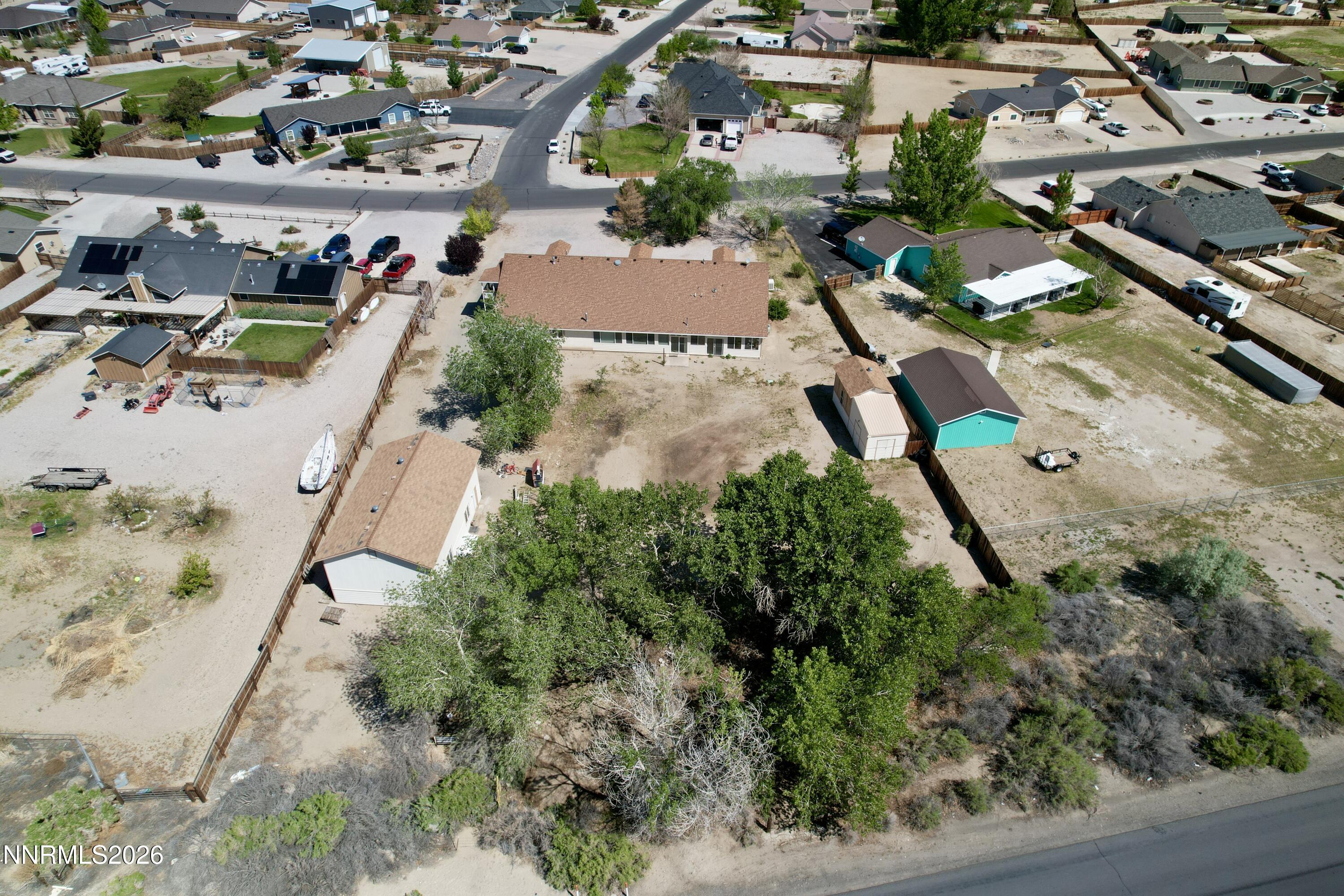 765 Hunter Park Way Fallon, NV 89406 - Photo 28 of 30 an aerial view of a house with a yard and lake