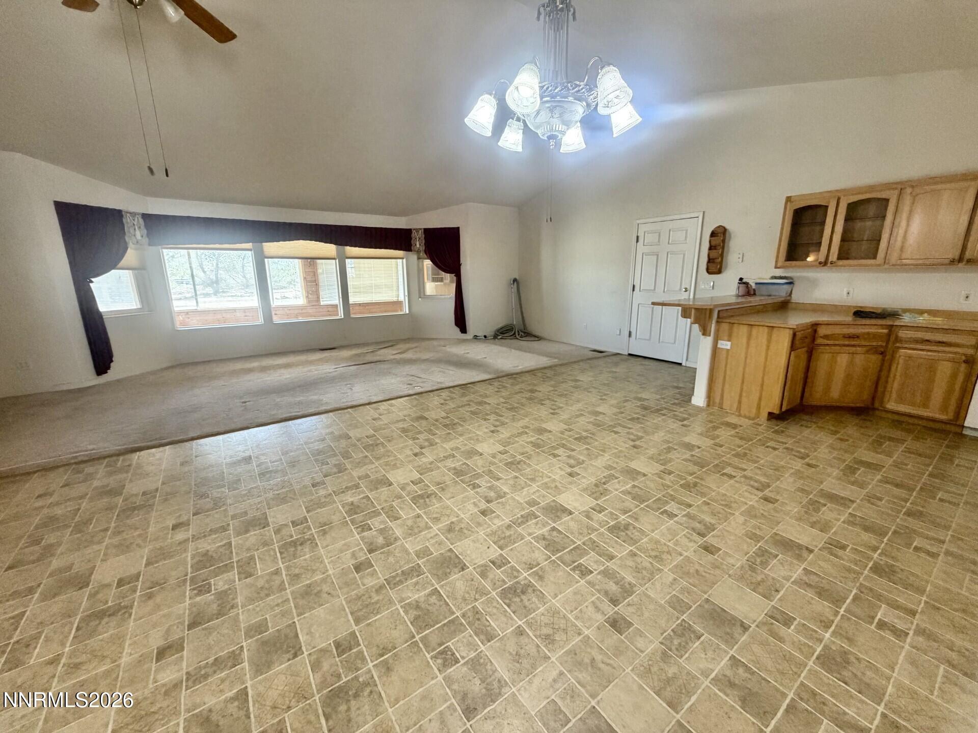 765 Hunter Park Way Fallon, NV 89406 - Photo 3 of 30 a view of a livingroom with furniture and a window