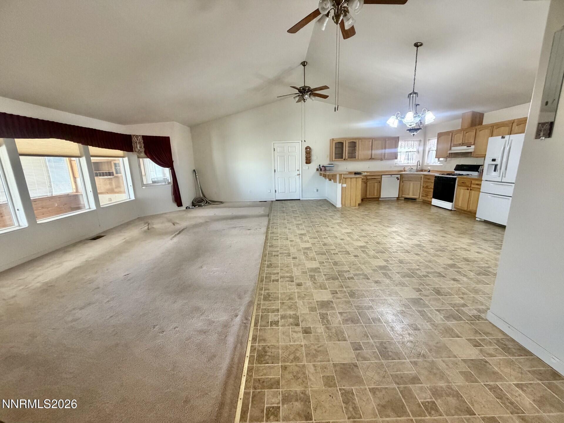 765 Hunter Park Way Fallon, NV 89406 - Photo 5 of 30 a view of a kitchen with a sink and cabinets