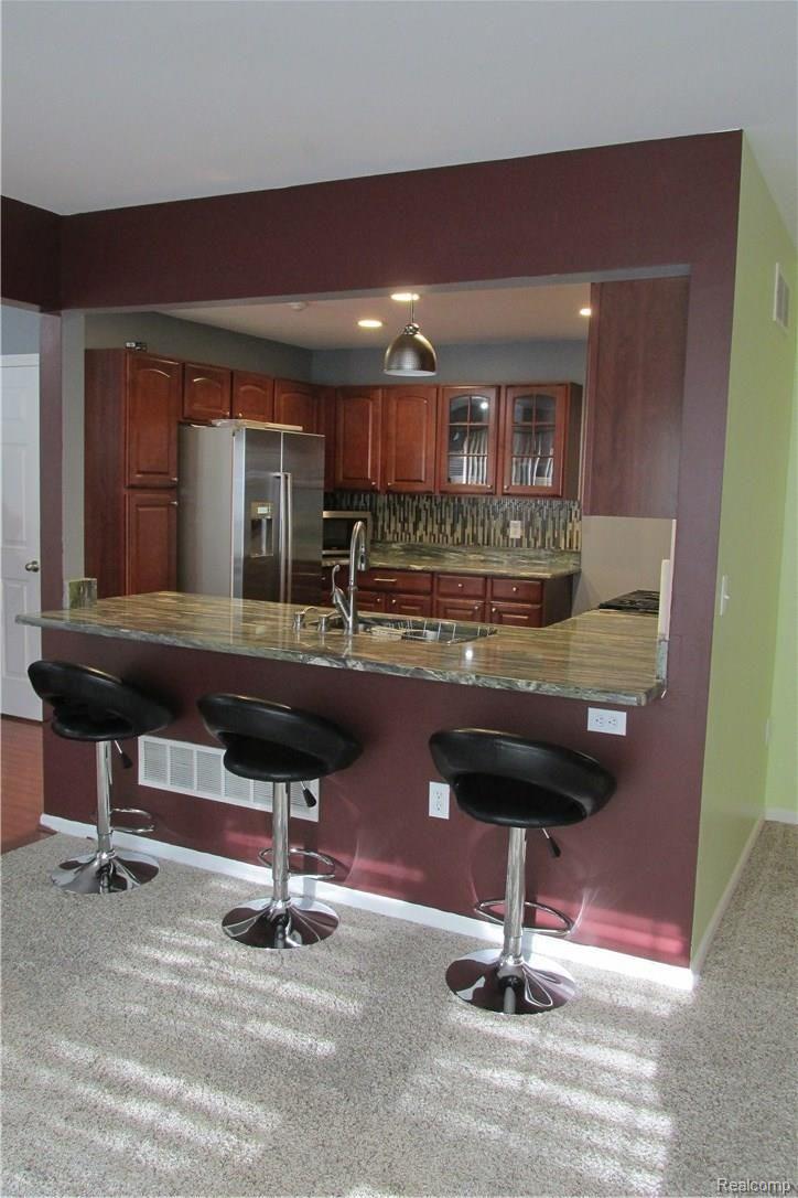 49153 Hawksburry Road, Unit 38 Canton, MI 48188 - Photo 5 of 28 IMG_2570.JPG