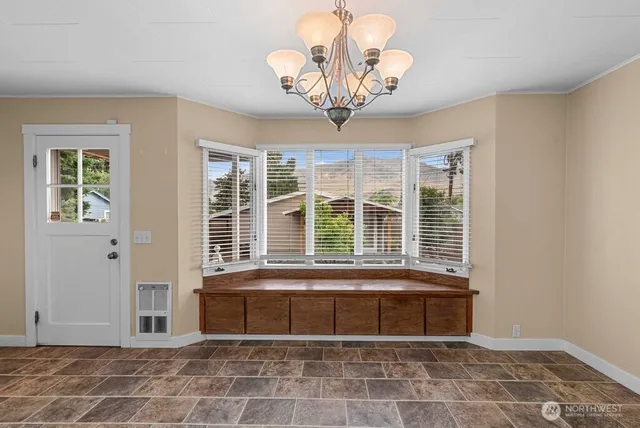 a room that has a bed and a window