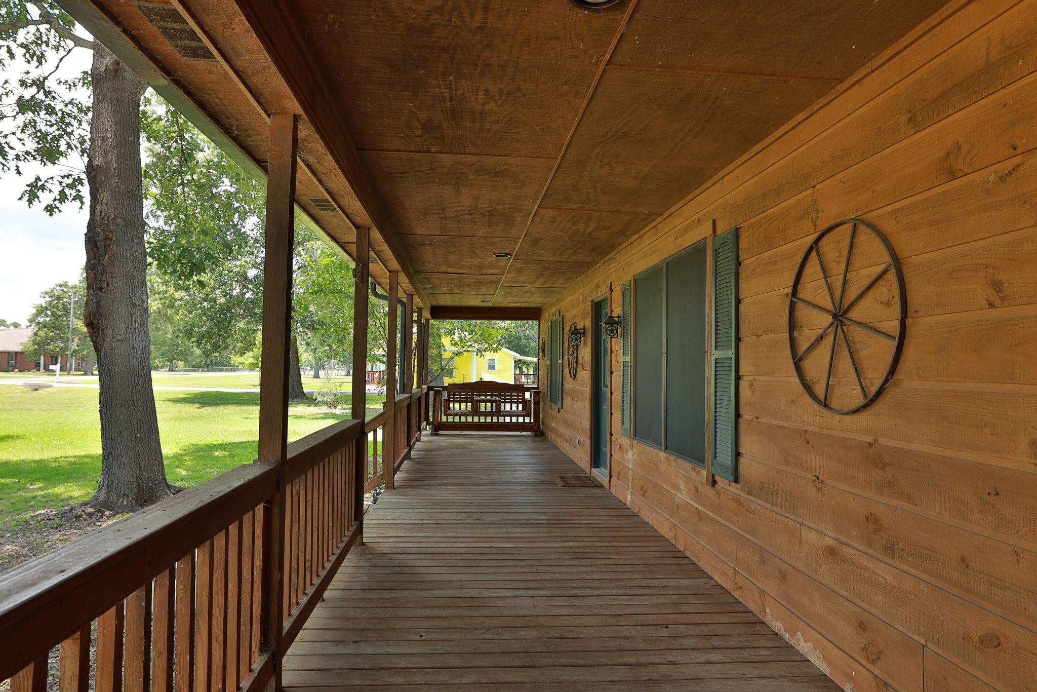 148 Crest Lane Onalaska, TX 77360 - Photo 11 of 38 Front covered porch with rustic vibes.