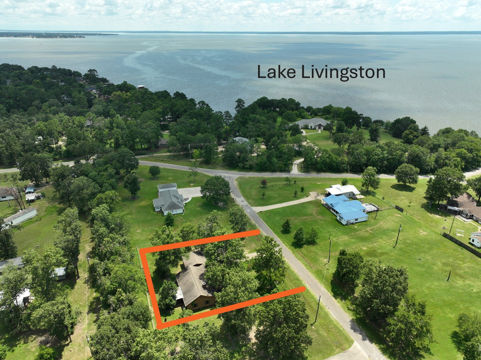 148 Crest Lane Onalaska, TX 77360 - Photo 2 of 38 Home location compared to the beautiful lake.