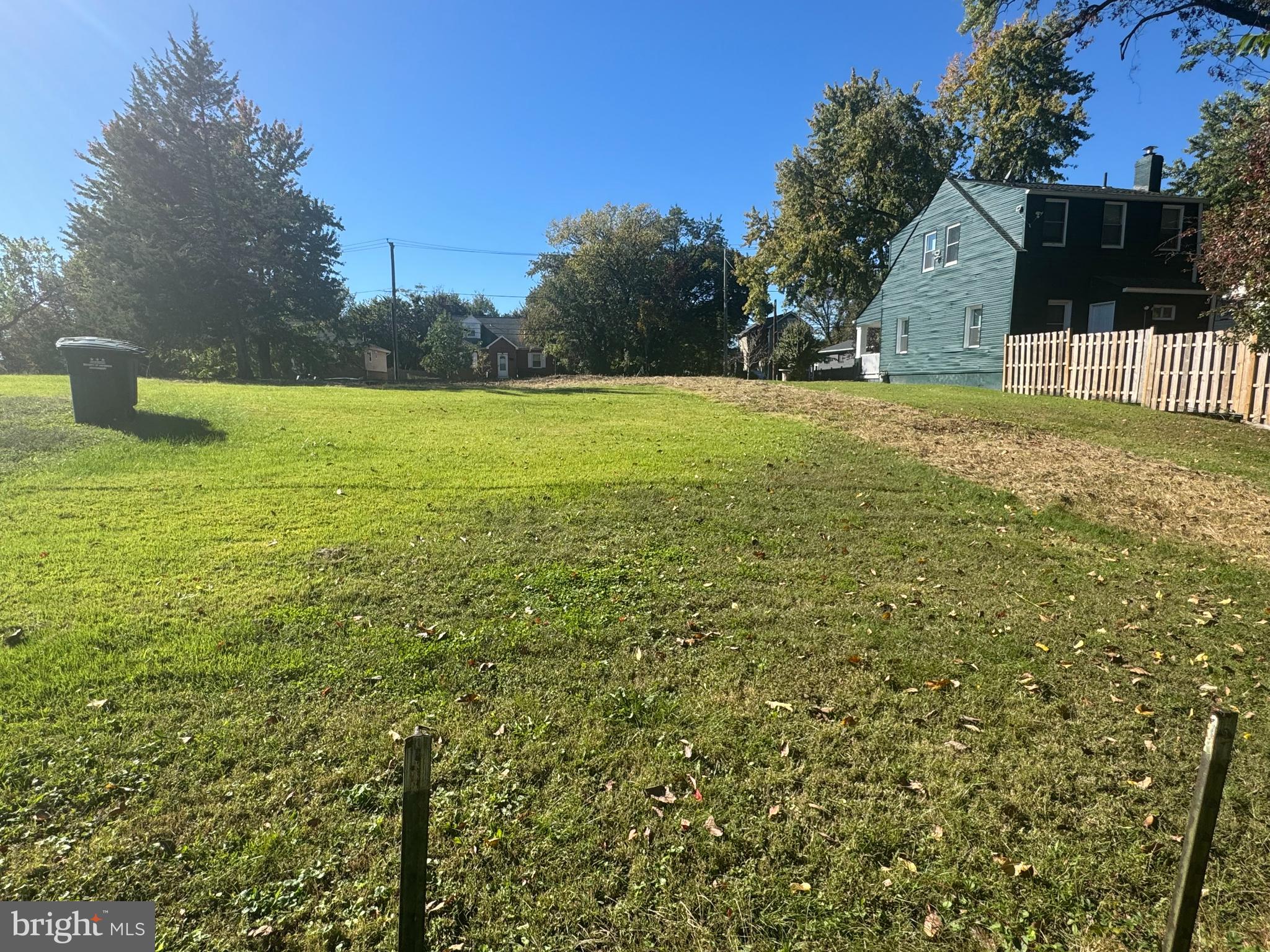 3122 20th Street Southeast Washington, DC 20020 - Photo 4 of 4 a view of a yard with a house in the background