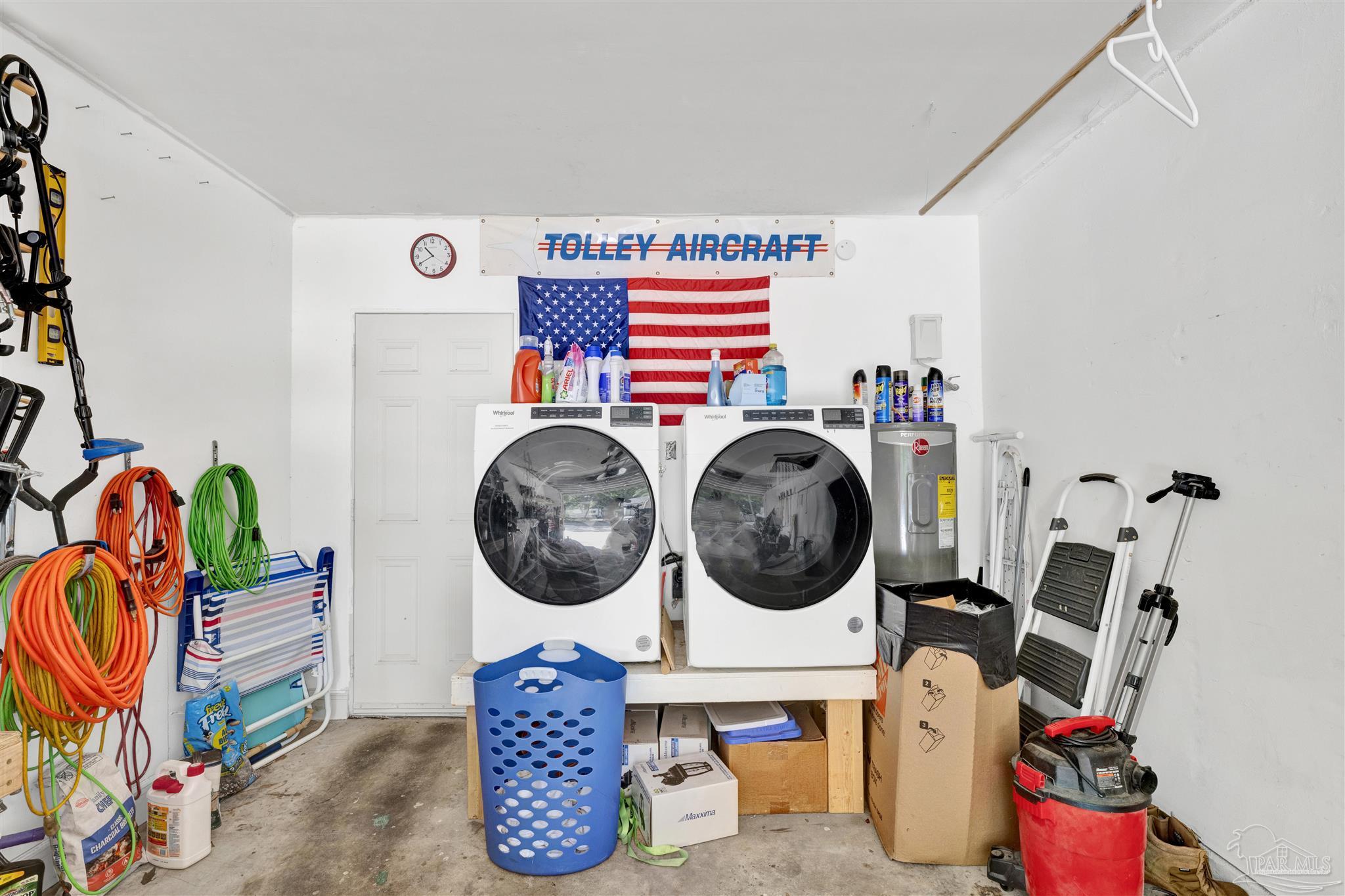 5131 Oakleaf Drive Pace, FL 32571 - Photo 14 of 23 a utility room with dryer and washer
