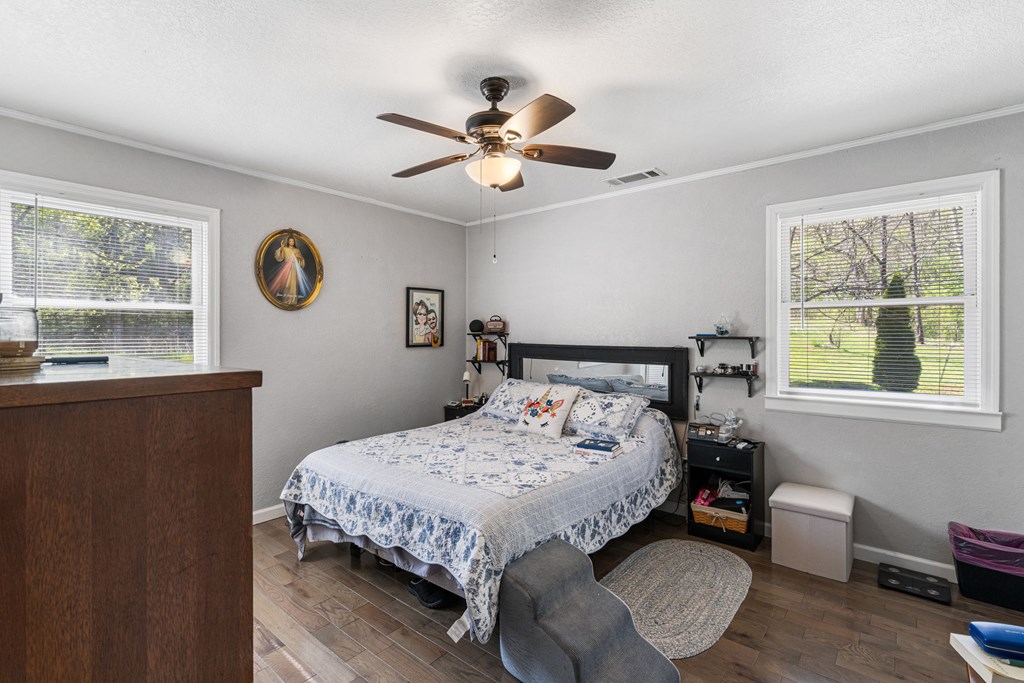 496 Jackie Cove Road Hayesville, NC 28904 - Photo 11 of 41 a bedroom with a bed and a window