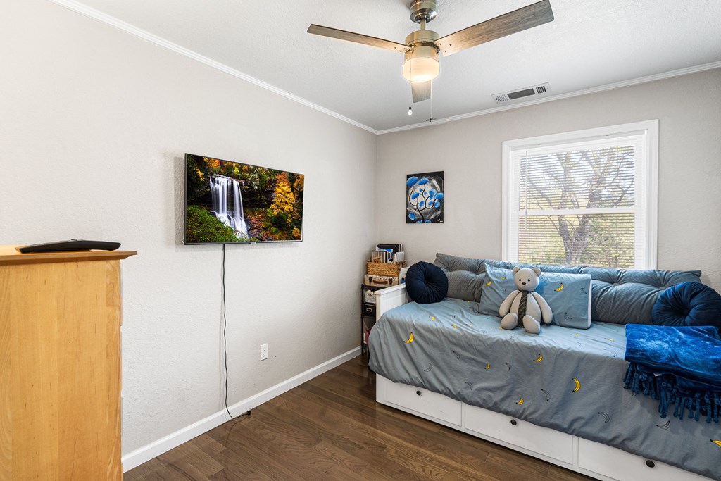 496 Jackie Cove Road Hayesville, NC 28904 - Photo 12 of 41 a bedroom with a bed and a couch