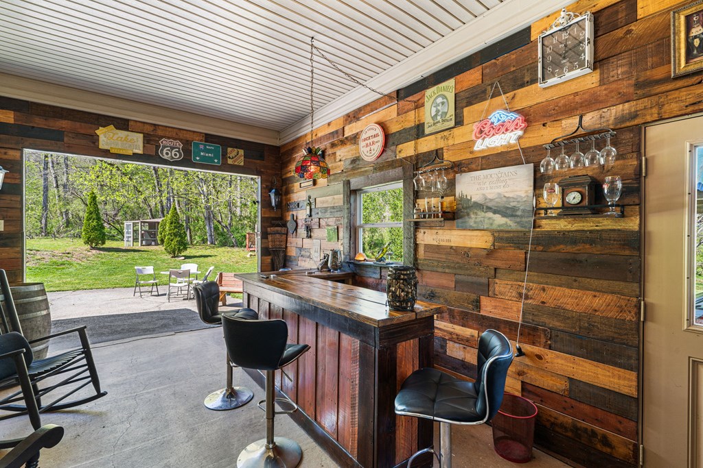 496 Jackie Cove Road Hayesville, NC 28904 - Photo 20 of 41 a outdoor seating area with furniture