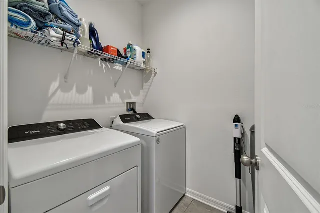 a view of balcony with wooden floor