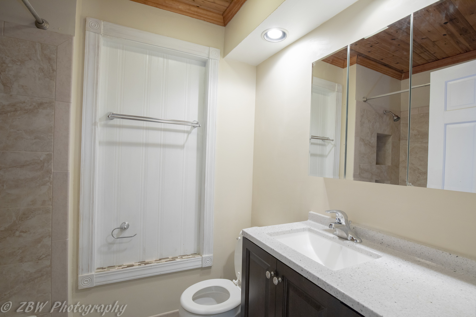 129 South Orchard Drive, Unit 1 Bolingbrook, IL 60440 - Photo 11 of 14 a bathroom with a granite countertop sink toilet and shower