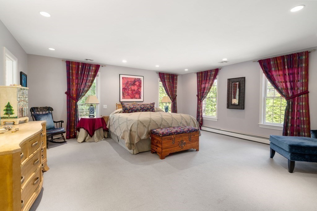 47 Claypit Hill Road Wayland, MA 01778 - Photo 12 of 21 a bedroom with a bed and a couch