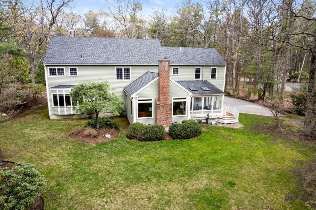 47 Claypit Hill Road Wayland, MA 01778 - Photo 19 of 21 a front view of a house with garden